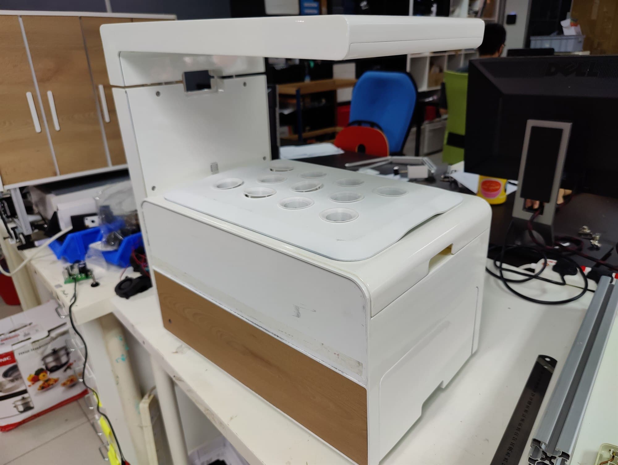 The benchtop Ripefresh hydroponic unit as a physical prototype on a workshop bench